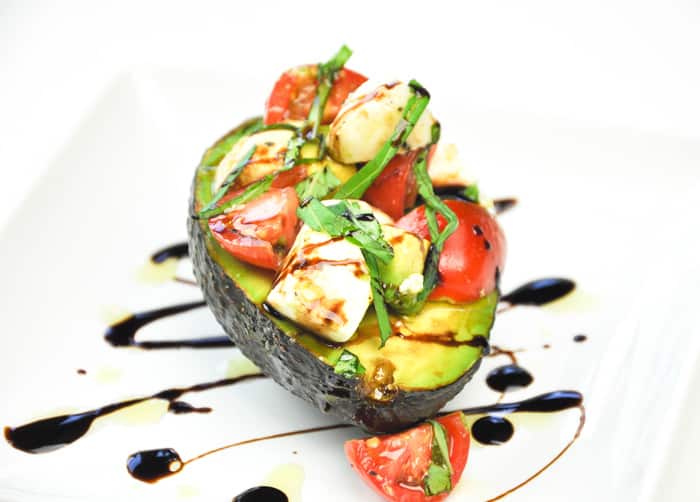 Completed Avocado Caprese Salad Drizzled with Balsamic Vinegar 