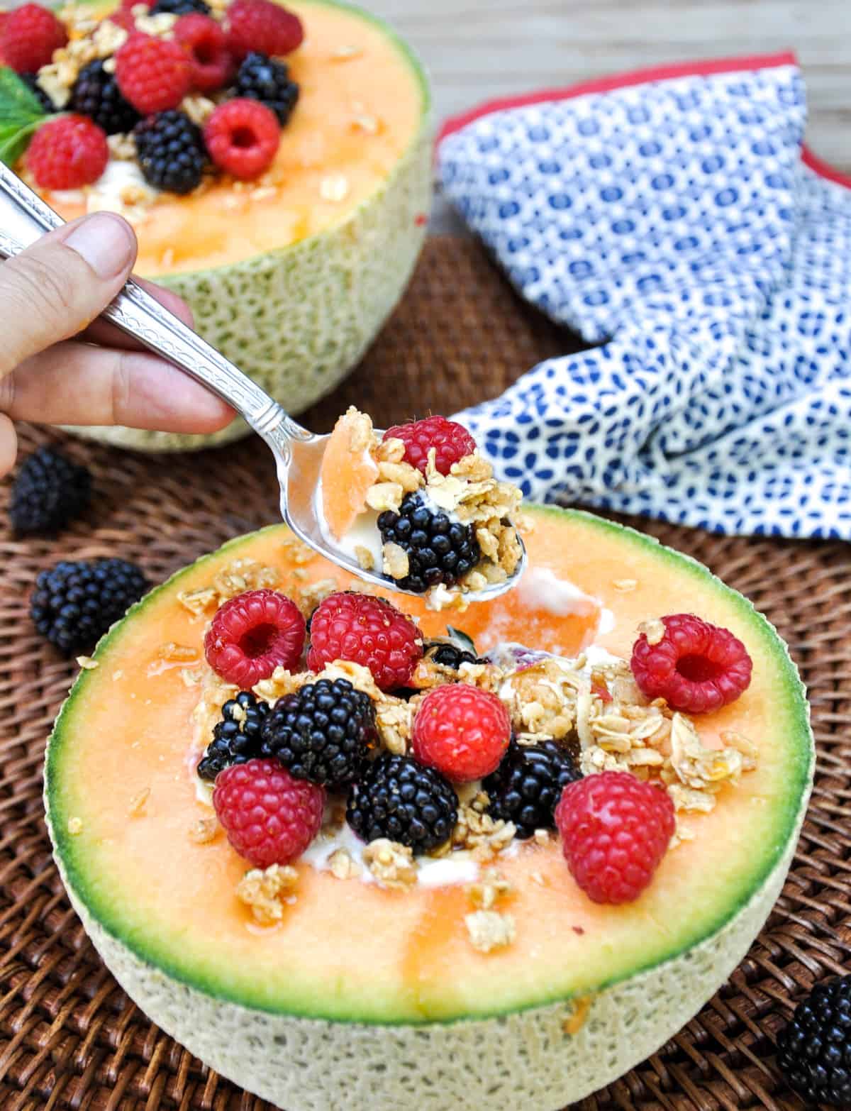 Cantaloupe Breakfast Bowls. Perfect for dessert too! Load the center with greek yogurt and top with fresh berries and granola. YUM!