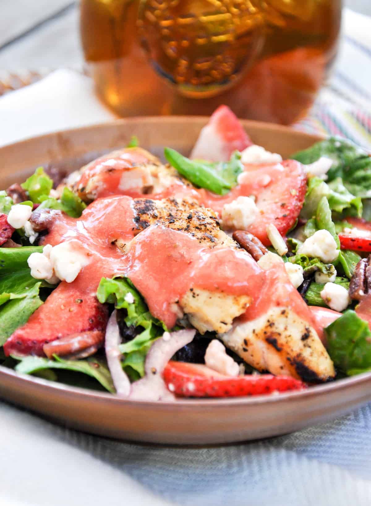 Strawberry Salad! With gorgonzola, pecans ad a bit of red onion. Plus topped with a fabulous strawberry vinaigrette!!