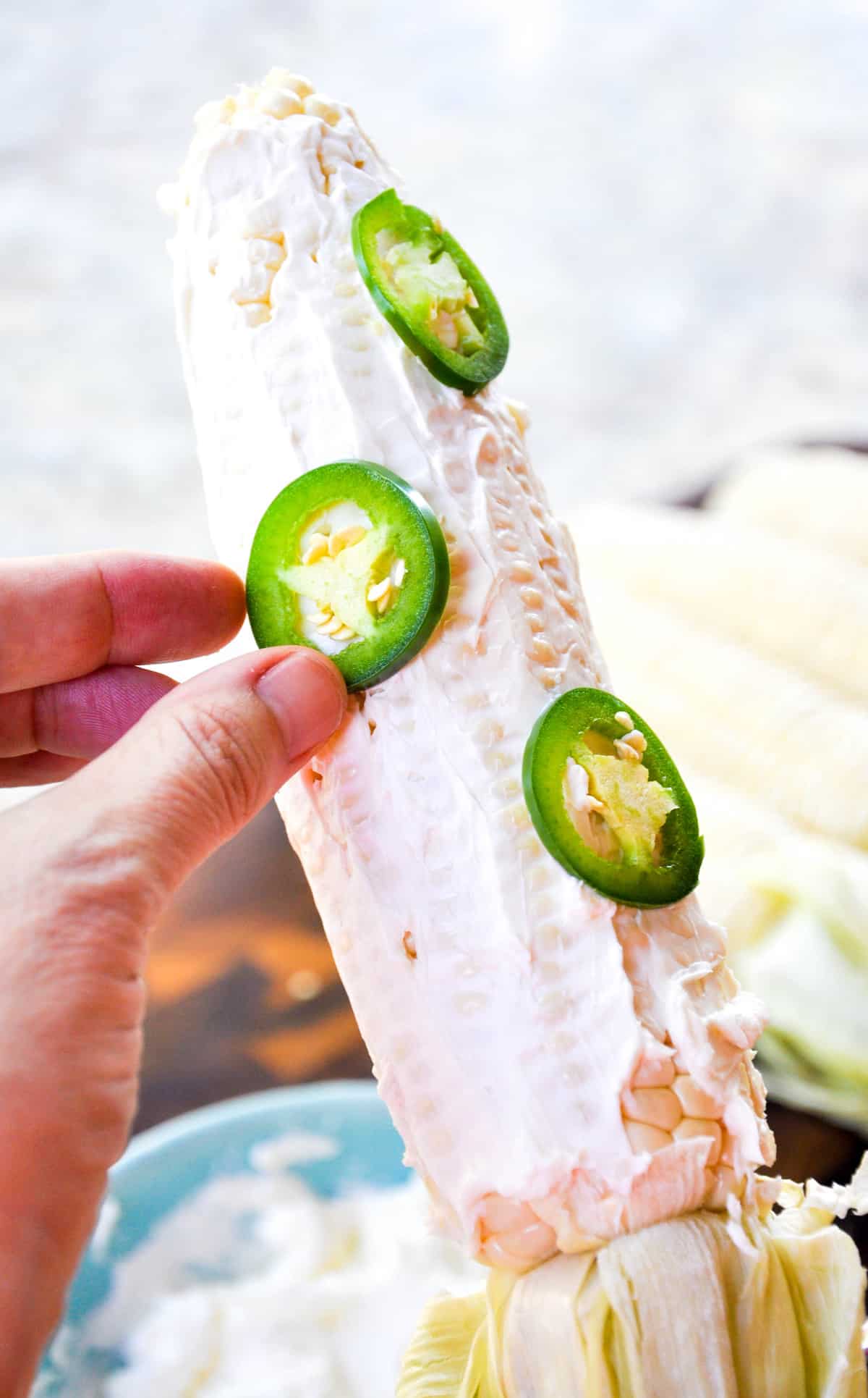 Jalapeno Popper Corn on the Cob. The best part? It's wrapped in Bacon! Can't get any better