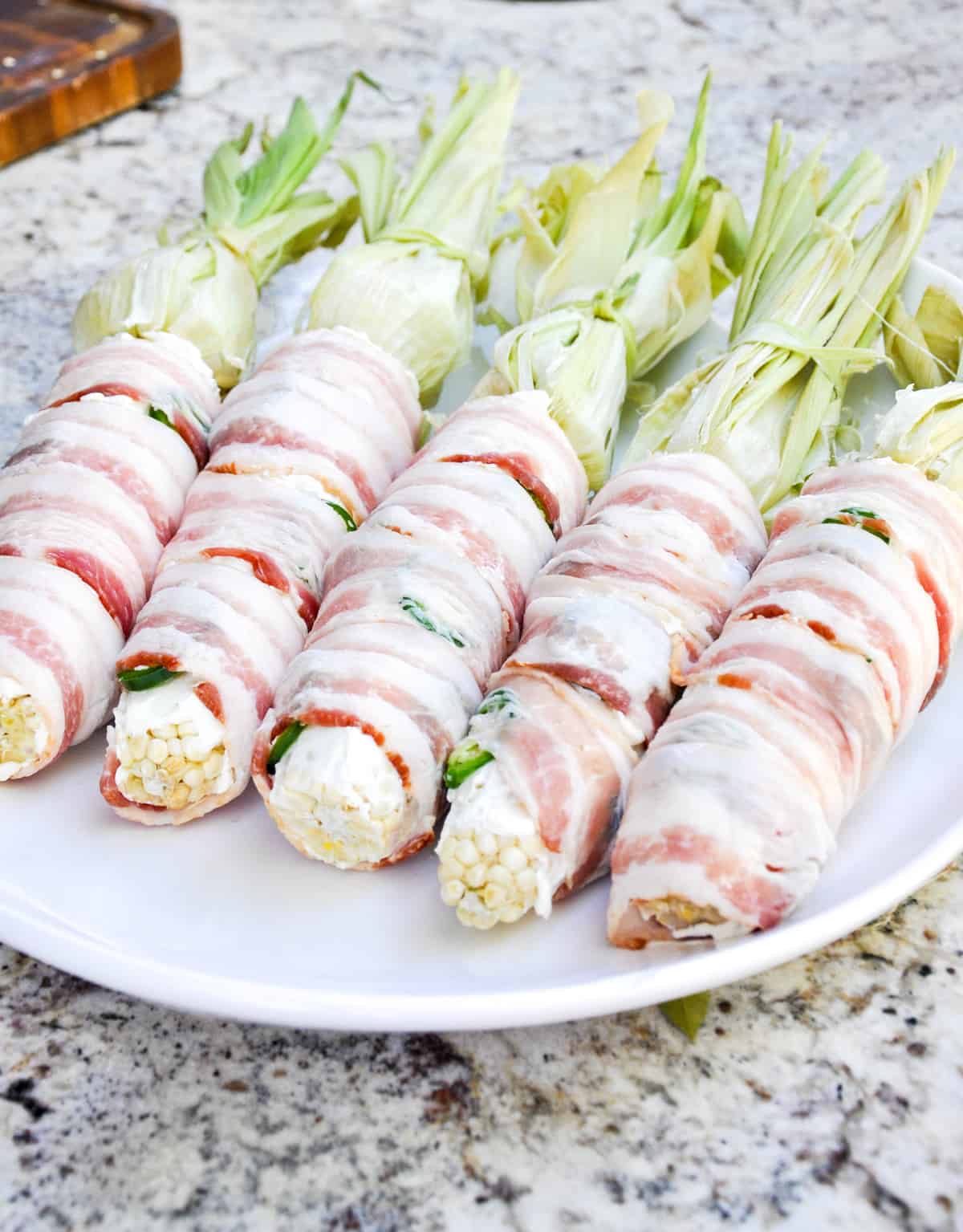 Jalapeno Popper Corn on the Cob. The best part? It's wrapped in Bacon! Can't get any better