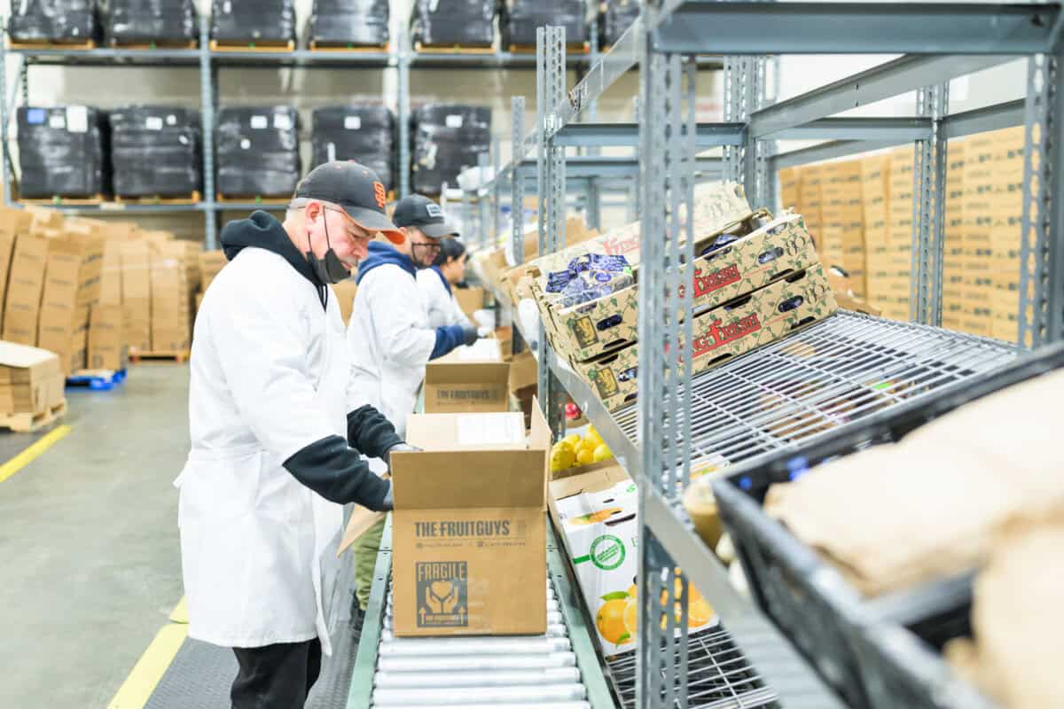 part of the packing team at The FruitGuys in South San Francisco