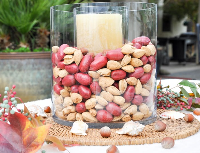 Using whole nuts in your Thanksgiving decor lends an organic feel to your Thanksgiving Table