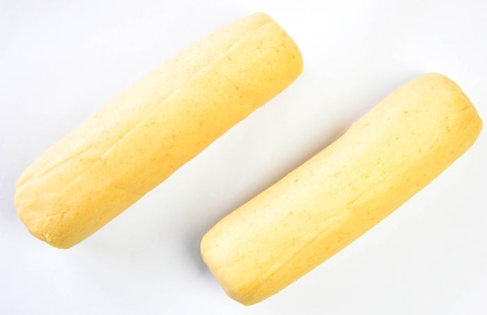 Citrus Shortbread Cookie Dough Rolled Out into Tube-Like Shape