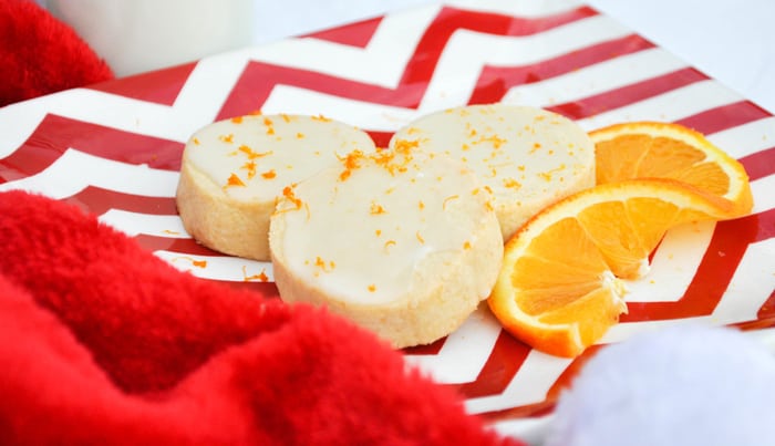 Citrus Shortbread Cookies Placed Next to Orange Slice