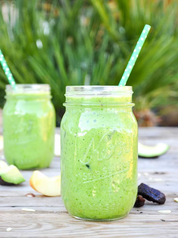 Two california green smoothies in mason jars