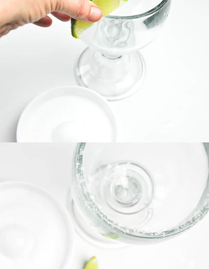 Rubbing a lime along the rim of the glass, then salting the rim