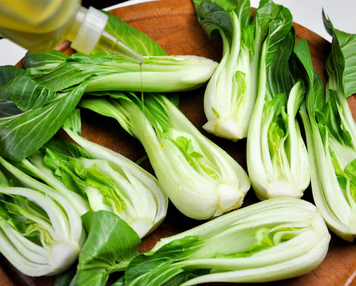 Olive oil drizzled over Bok Choy 