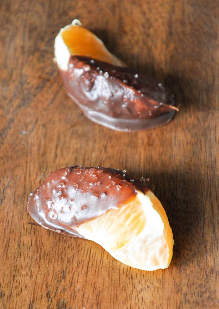 Two Tangerines Covered with Dark Chocolate and Sea Salt 