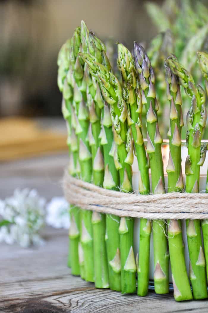 Asparagus Candles :: Add fresh asparagus around a cylinder shaped candle and instant springtime happiness