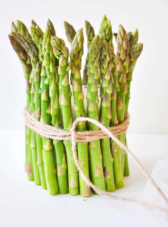 Asparagus Candles :: Add fresh asparagus around a cylinder shaped candle and instant springtime happiness