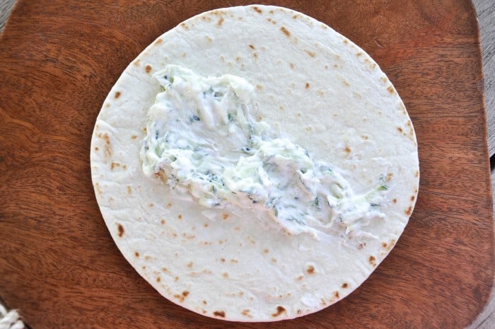 Warm tortilla with cucumber spread