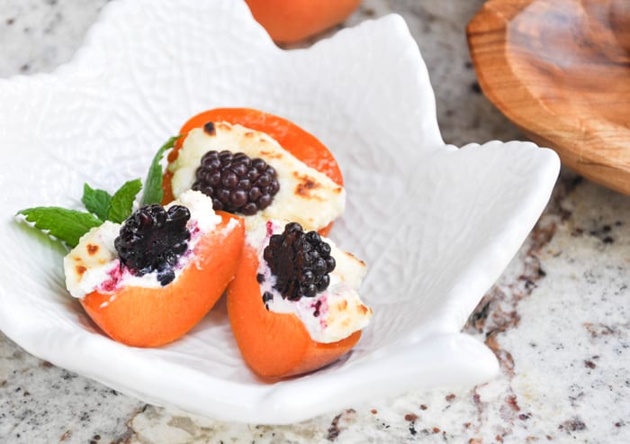 sliced apricots stuffed with cream cheese and berries