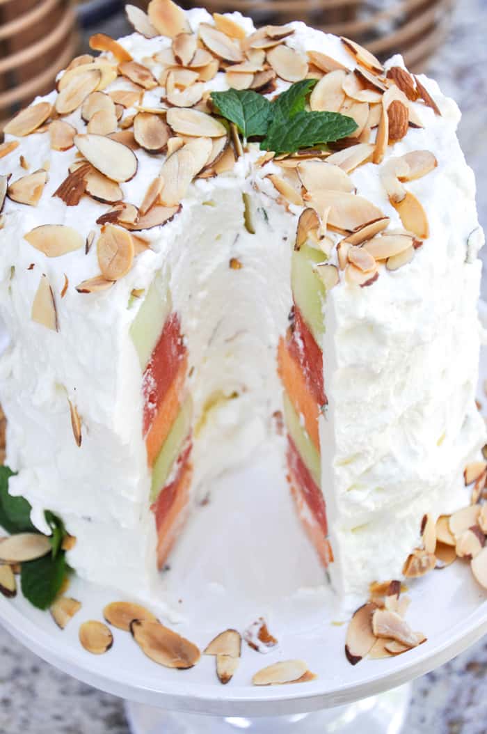 Triple Melon Layer Cake with Slice Missing