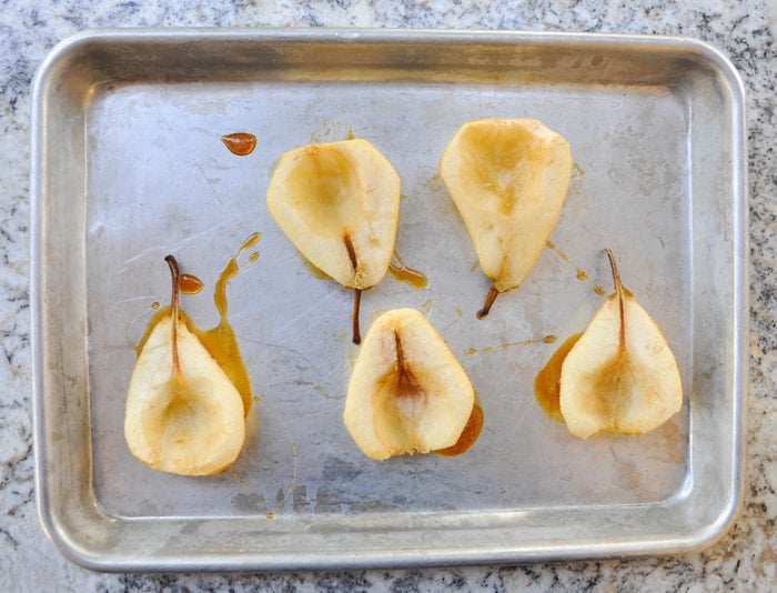 Bartlett Pear halved with honey drizzled over
