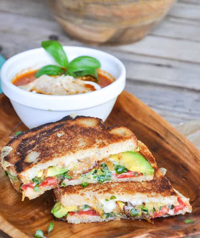 Garden Grilled Cheese - Cheesy comfort with avocado, tomato, grilled onions and microgreens