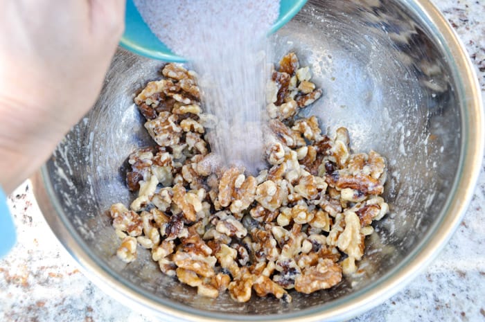 Add spice mixture to egg yoked covered walnuts