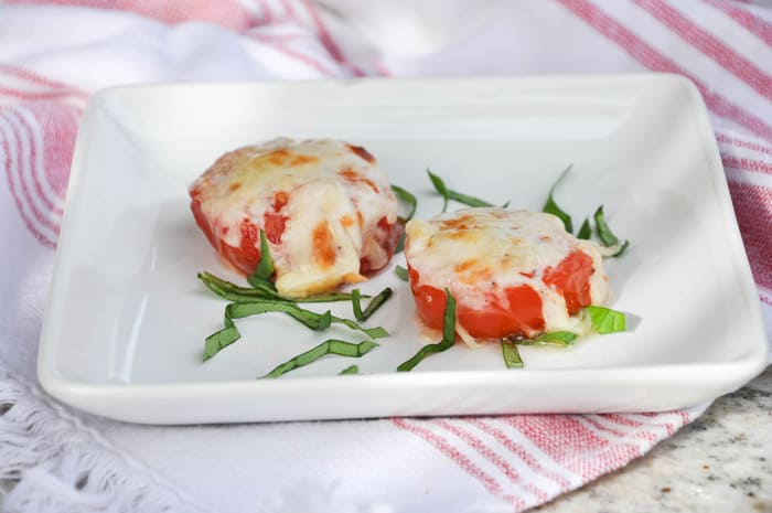 Roasted Garlic Cheese Tomatoes on Tray with Basil Strips