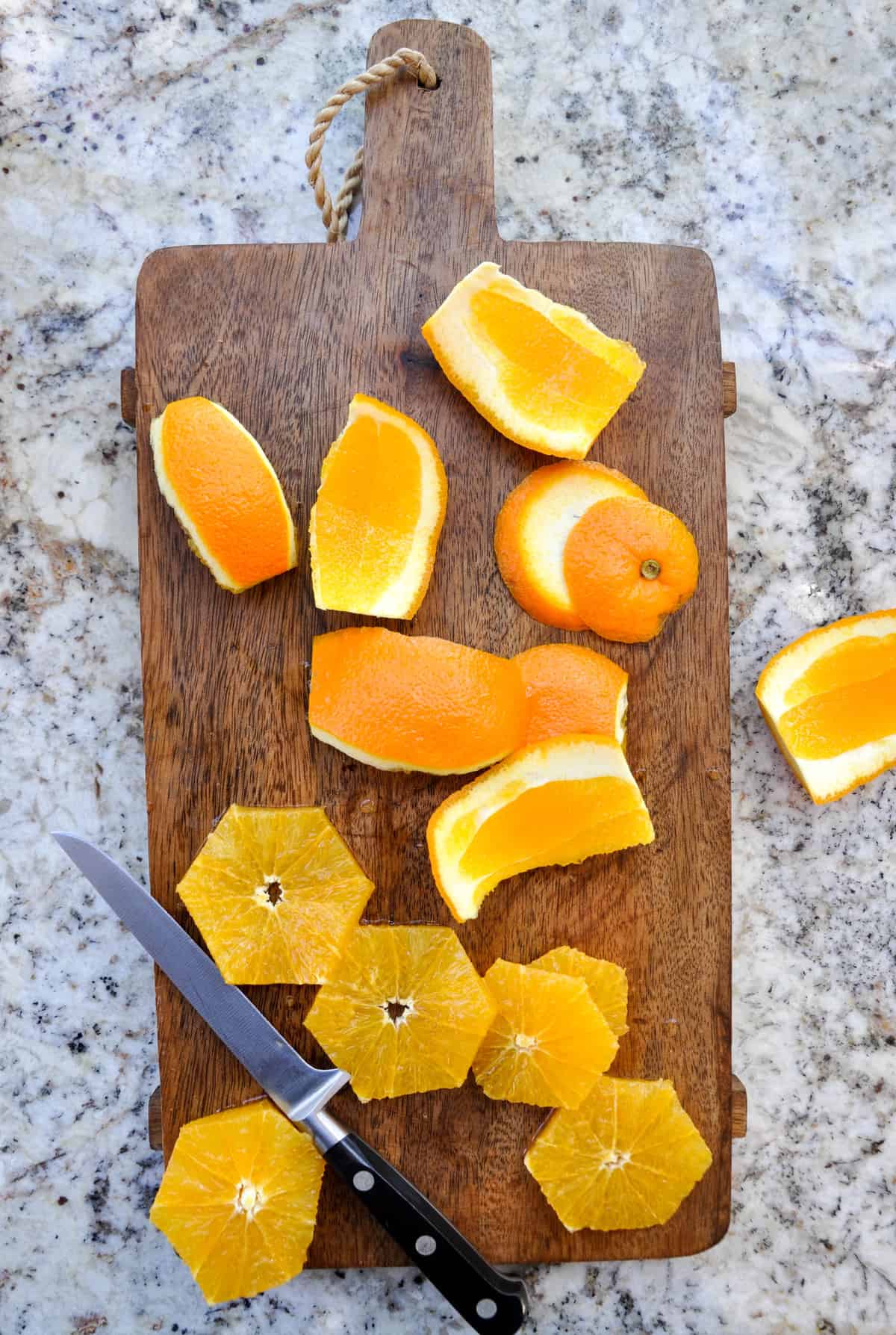 Citrus sliced up on a cutting board