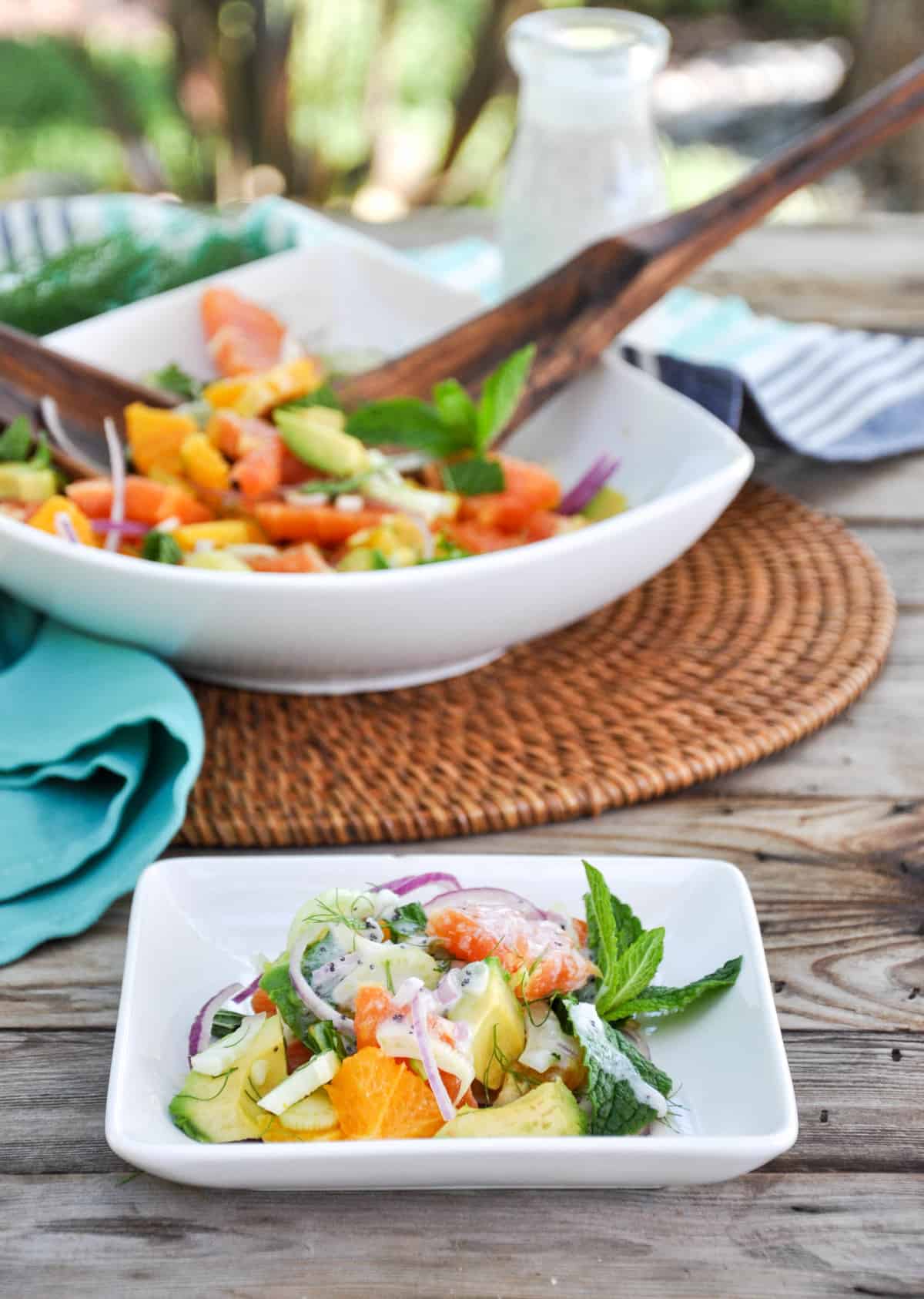 Citrus Spring Salad in serving bowl and on a plate