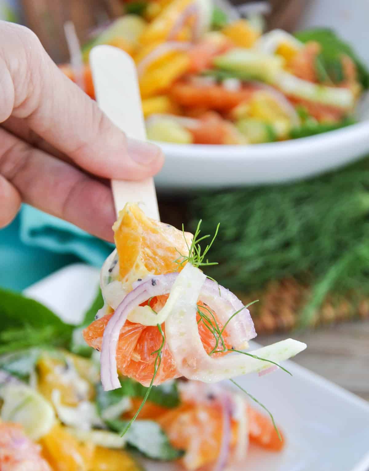 Fork picking up Citrus Spring Salad