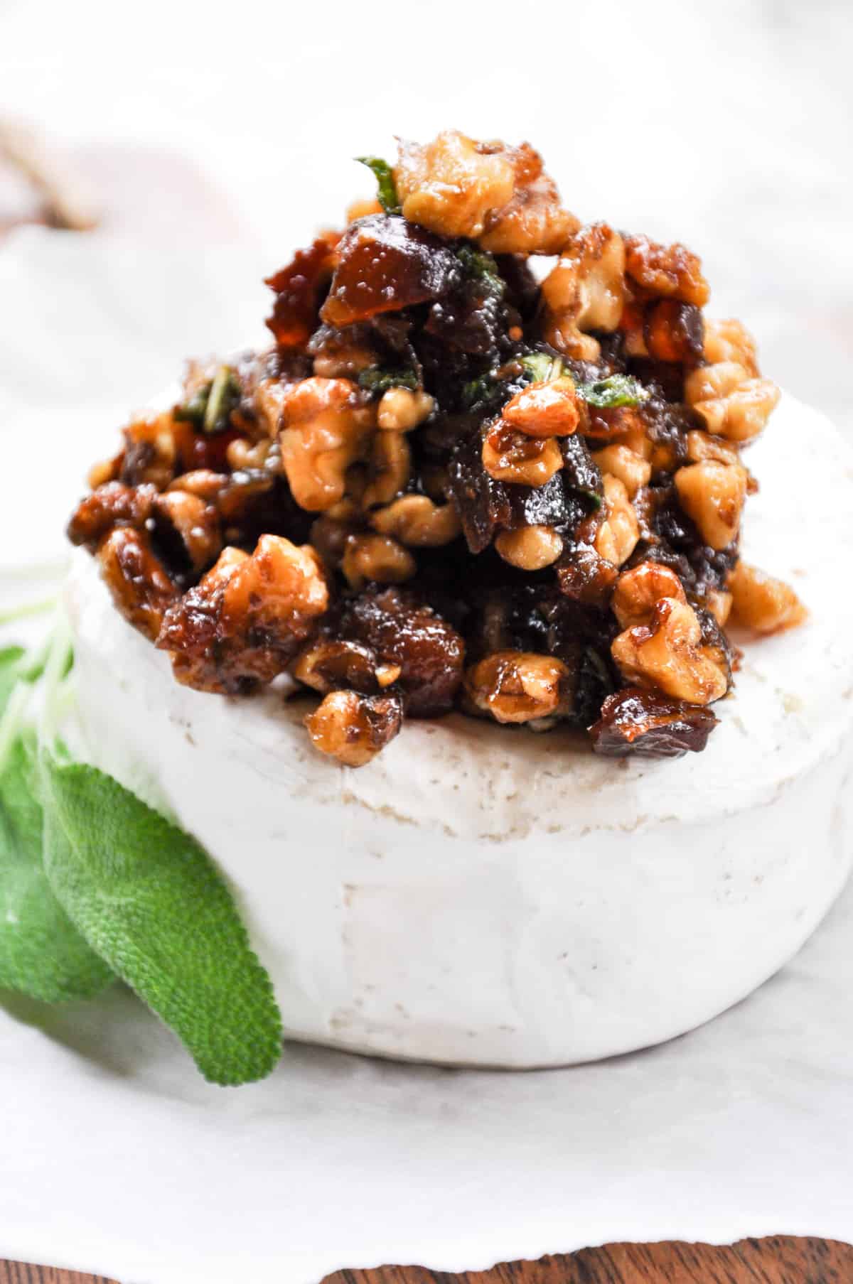 Close up of Medjool Dates and Walnuts with a bit of Sage