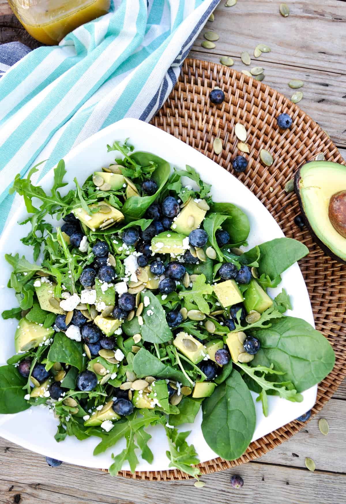 Blueberry Avocado Salad with feta, pumpkin seeds in a honey vinaigrette