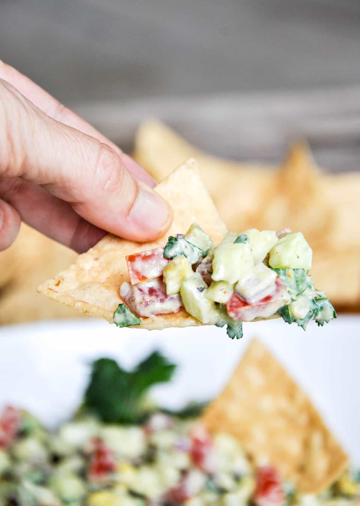 Chip scooping Creamy Cucumber Salsa