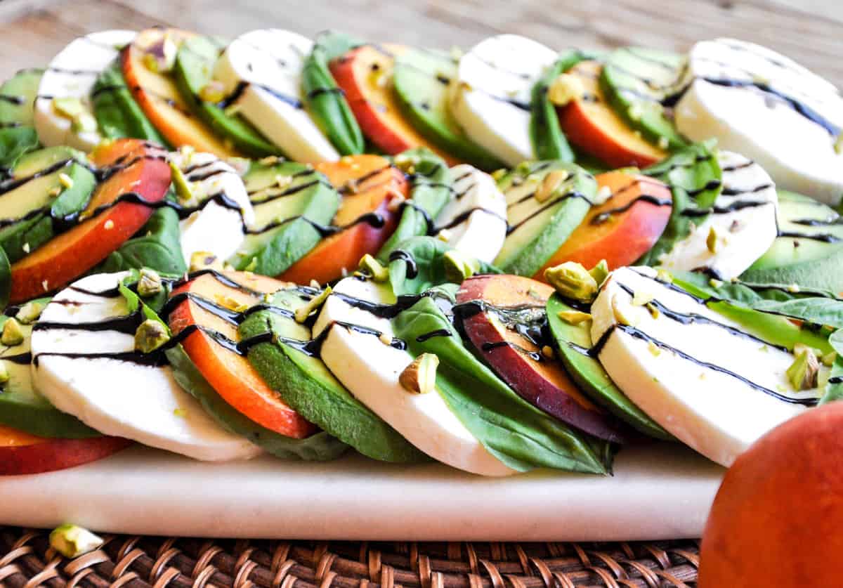 Summerfy your Caprese salad using nectarines and avocado. Delish!