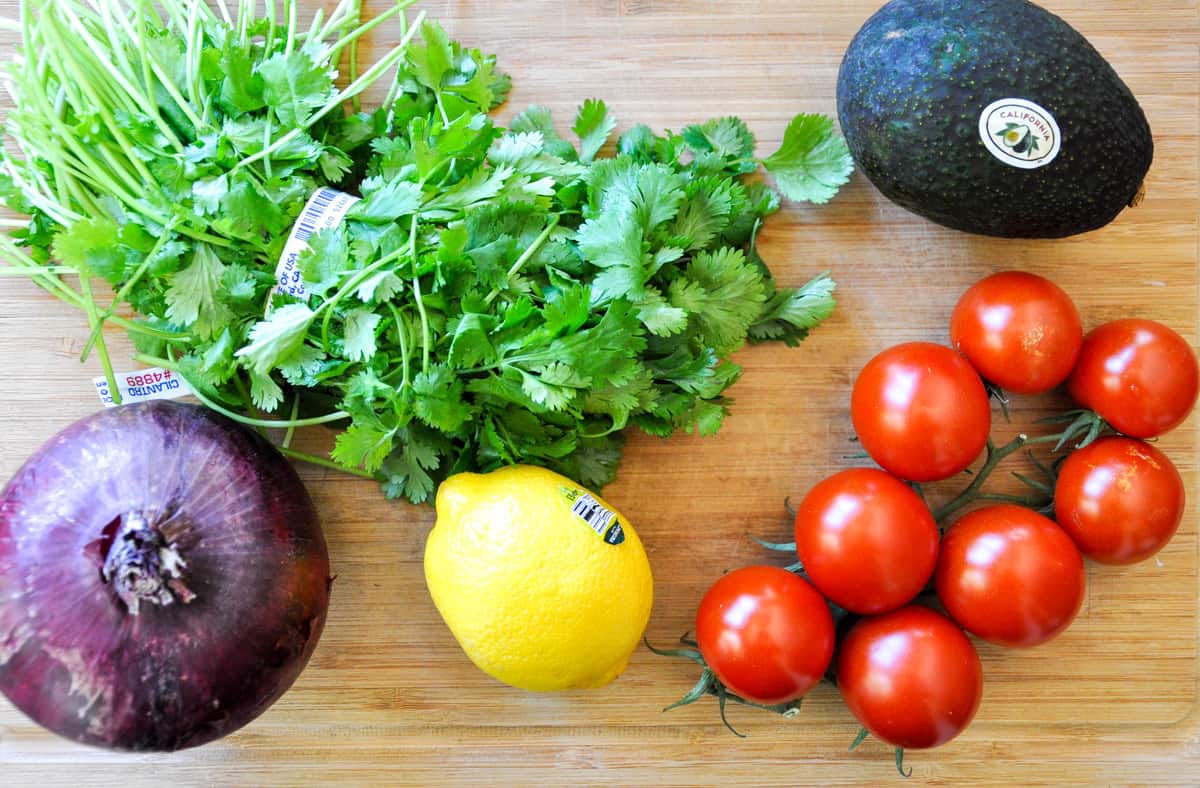 Ingredients: red onion, cilantro, lemon, tomatoes, and avocado 