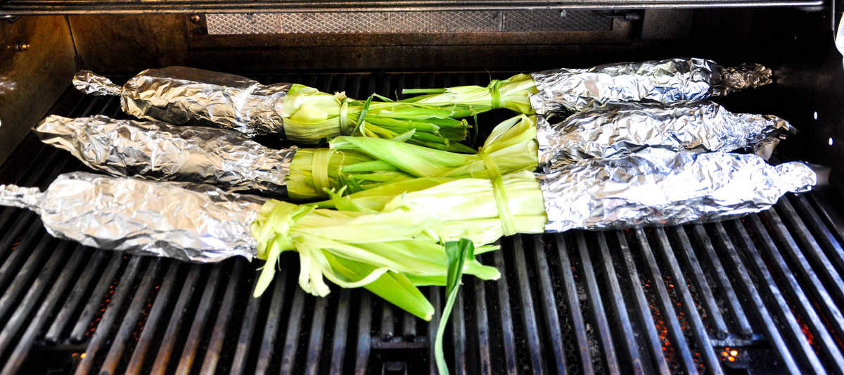 Wrapped Jalapeno Popper Corn on the Cob on the grill