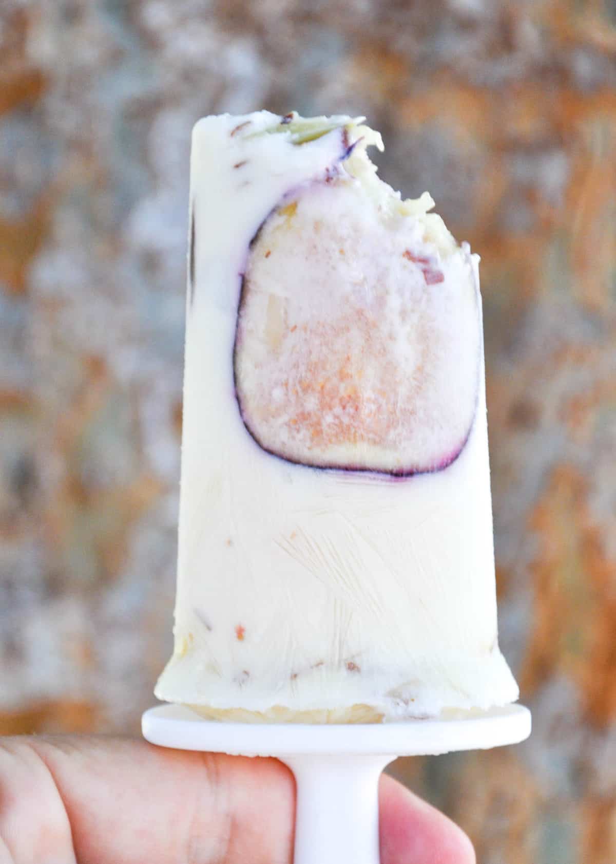 Black Mission Fig and Almond Popsicles with a bite taken out
