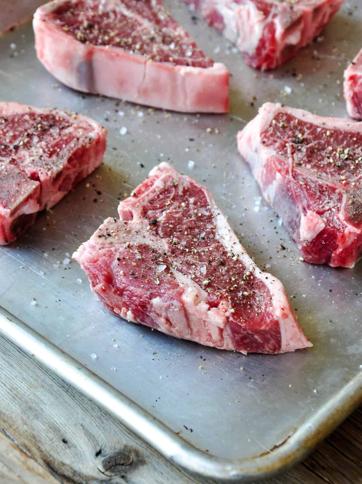 lamb loin chops seasoned with salt and pepper