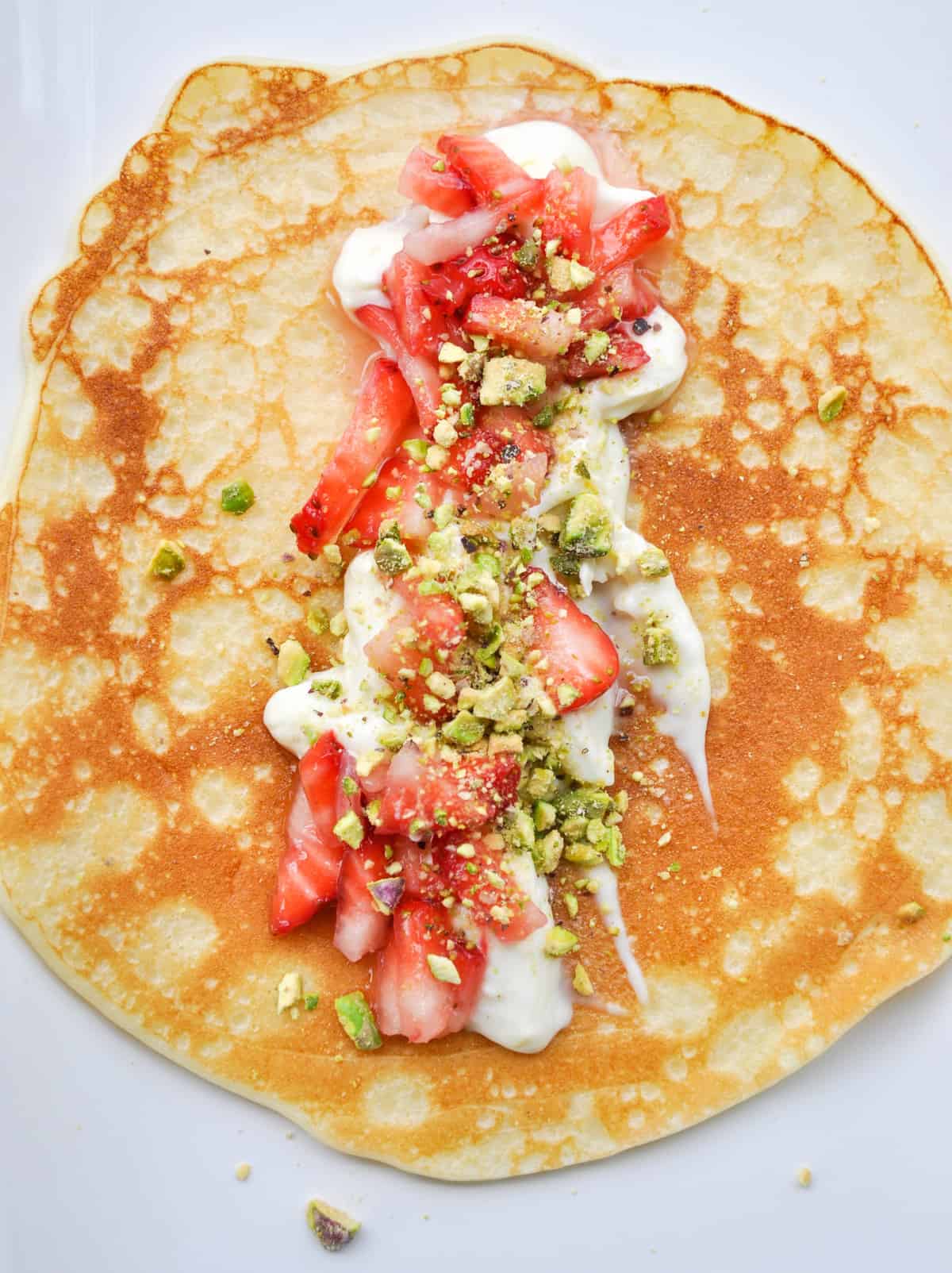 Lemon Crème Crepes with Strawberries and Pistachios 