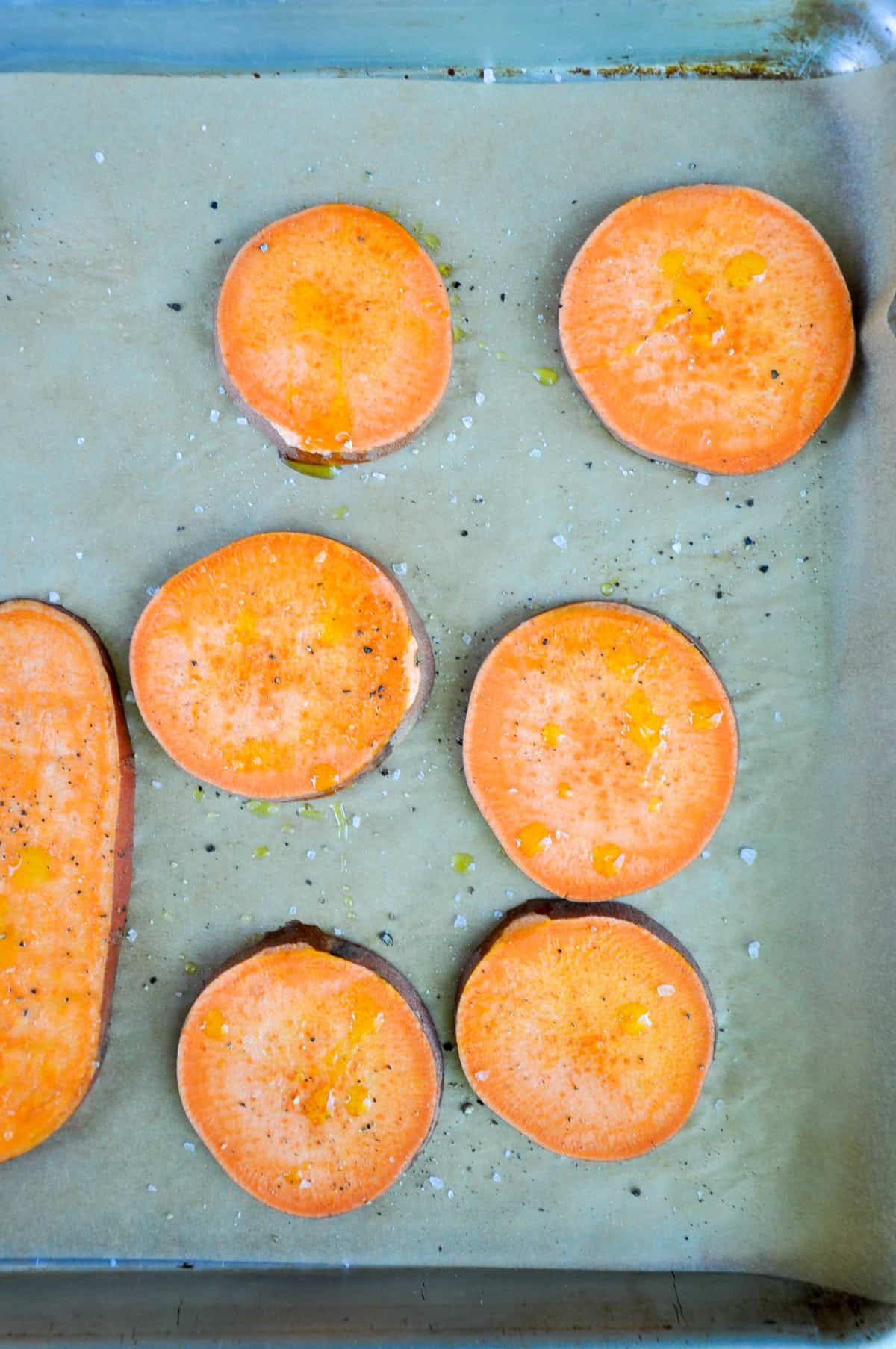 Drizzle sweetpotatoes with olive oil and salt and pepper