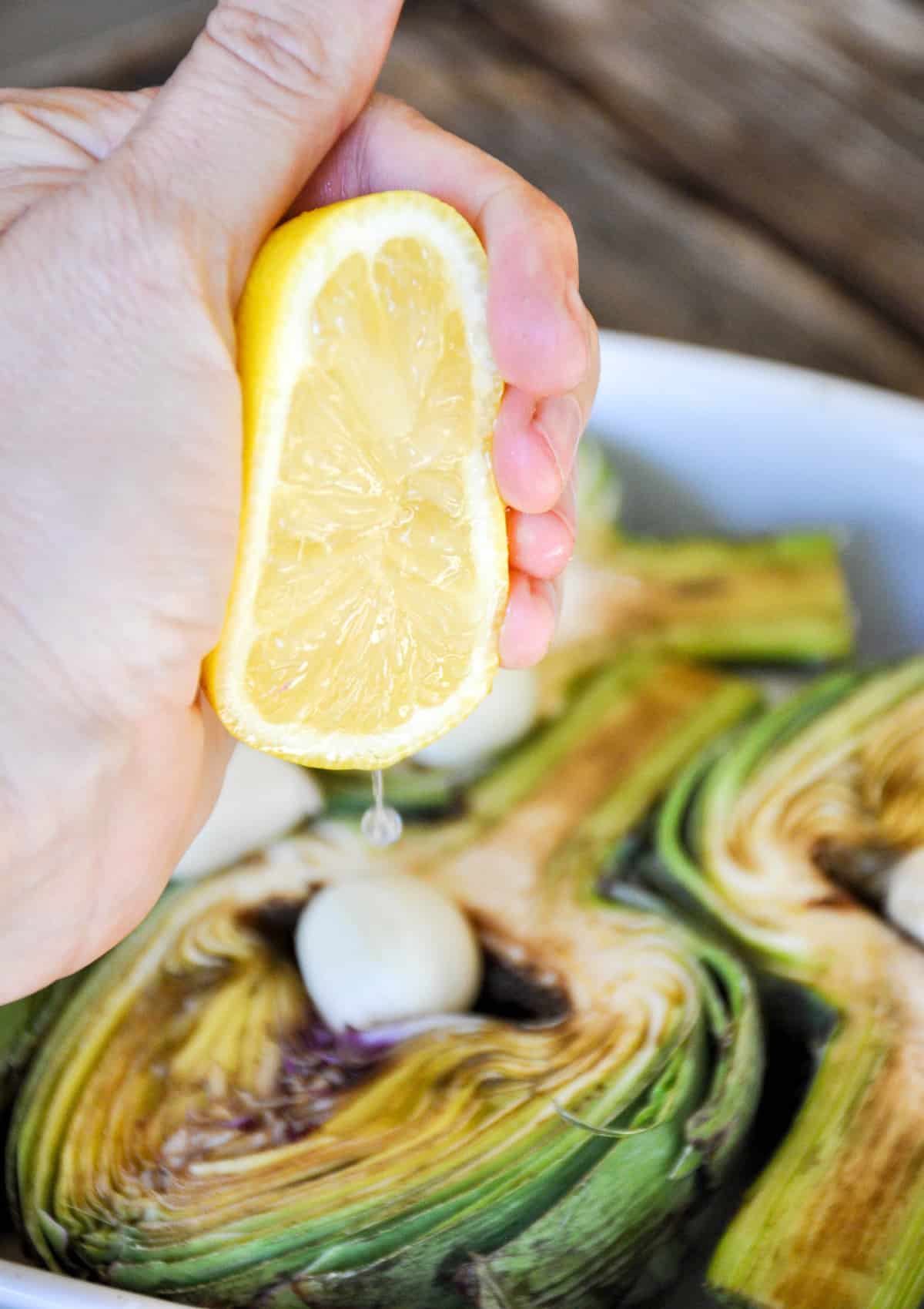 Squeeze lemon juice over artichokes 