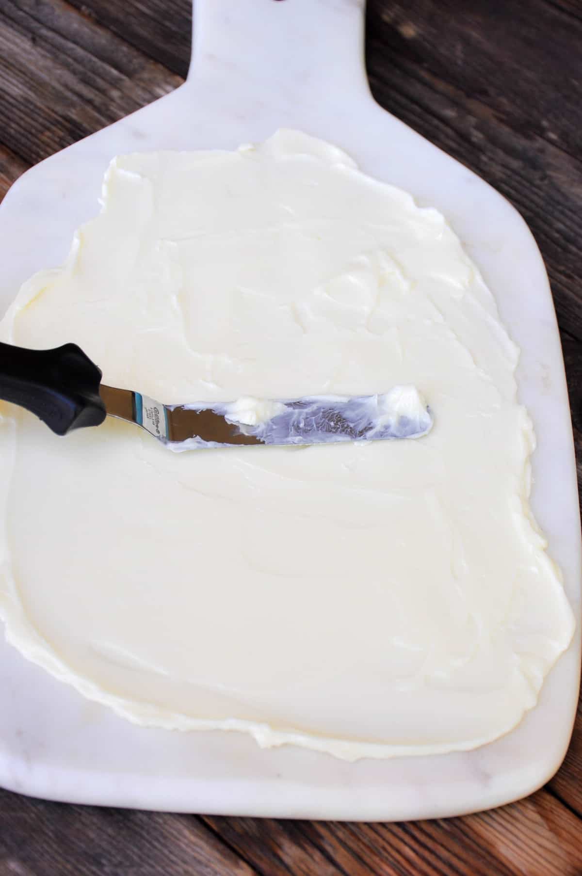 spread butter onto platter