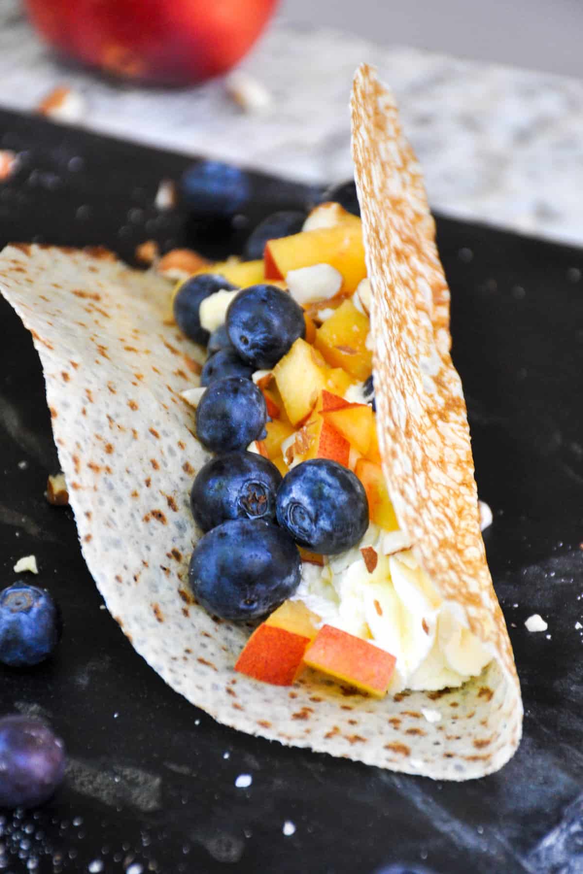 Dessert tacos with nectarine and blueberry