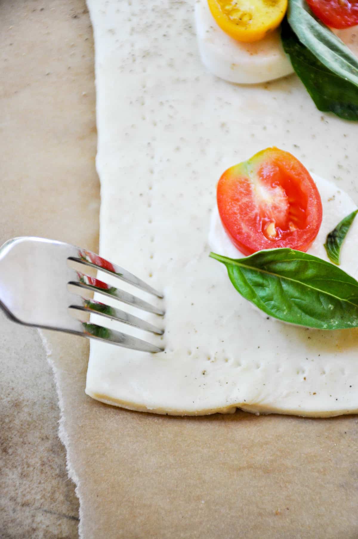 Poke holes in dough using fork