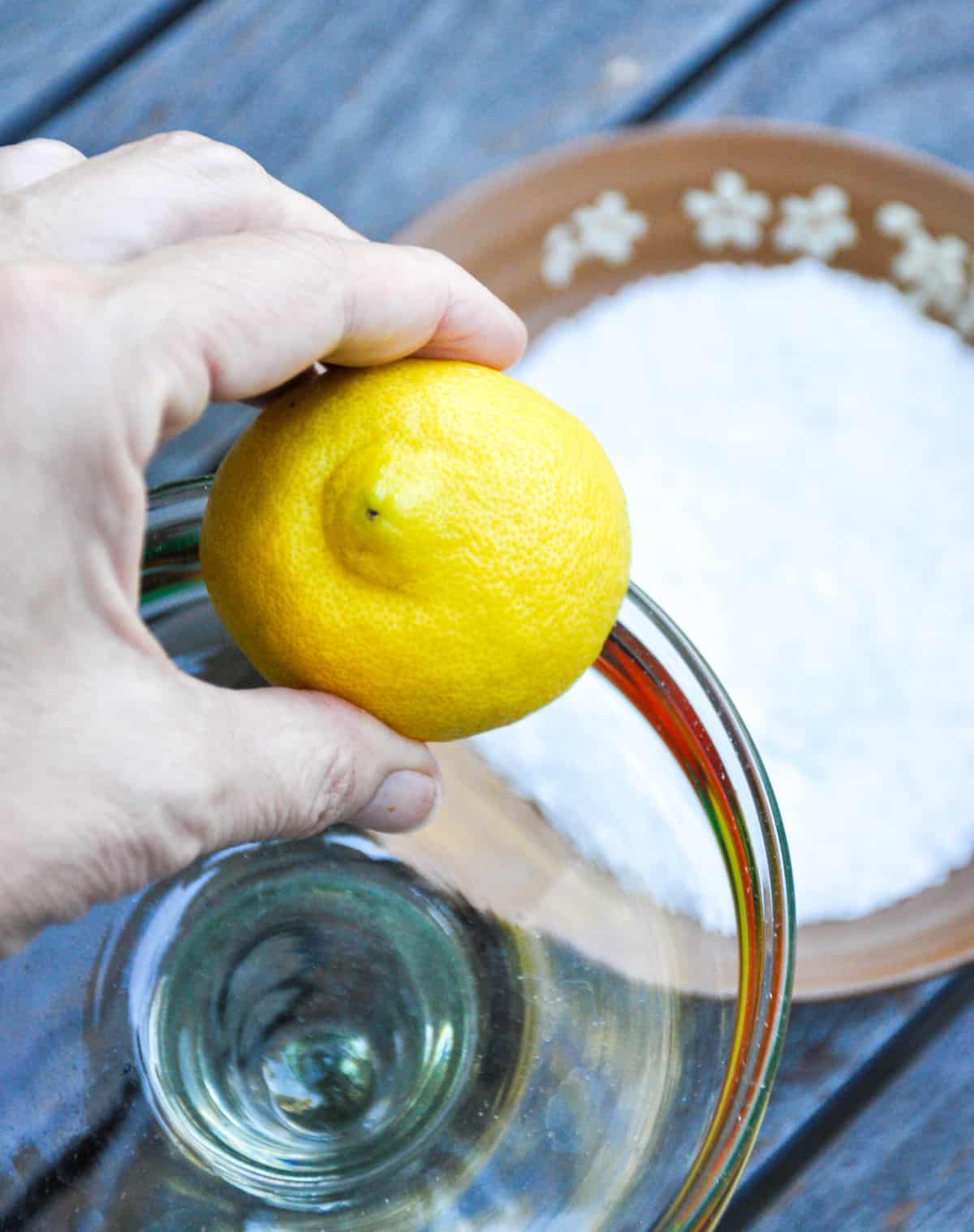 Use lemon to moisten the rim of glass