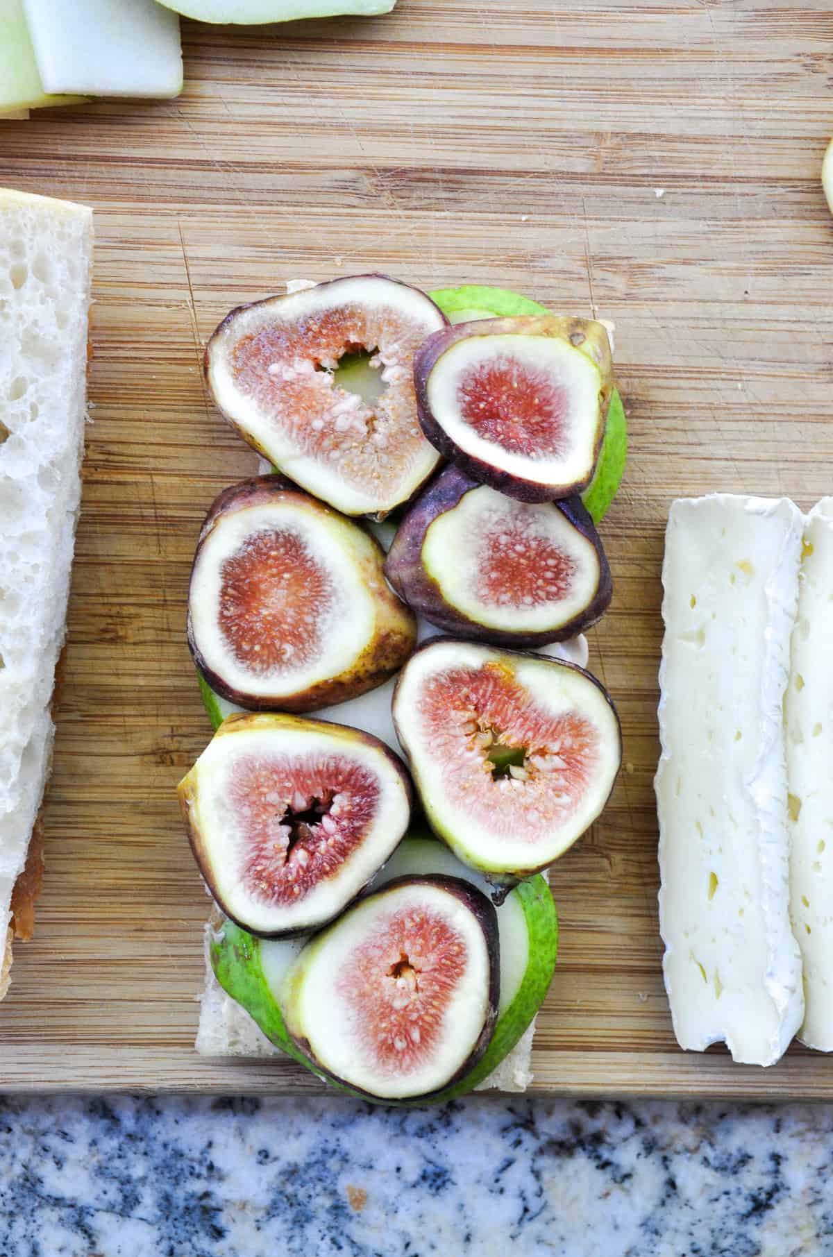 Layer sliced fig over pear