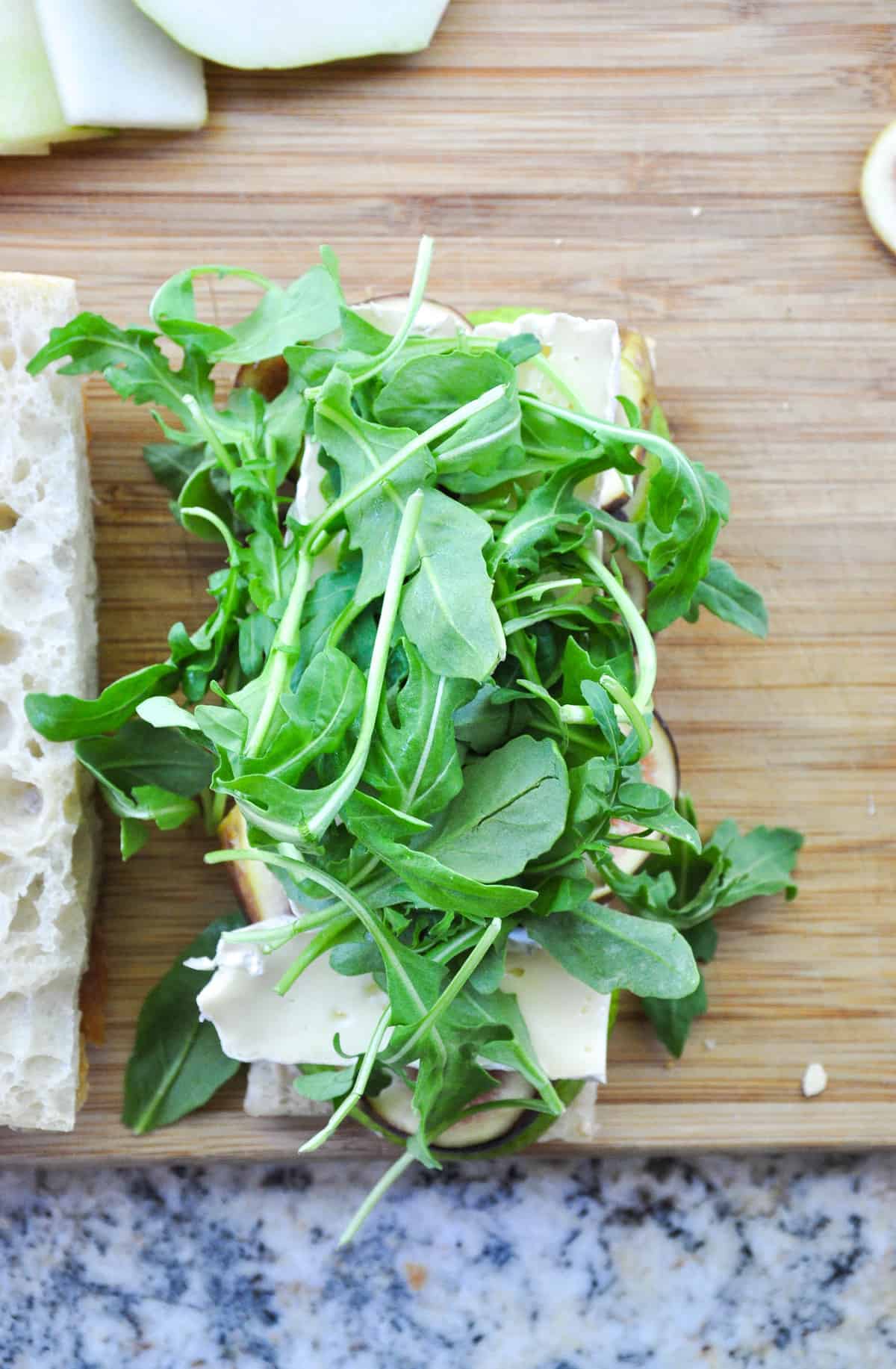 Top with Arugula 