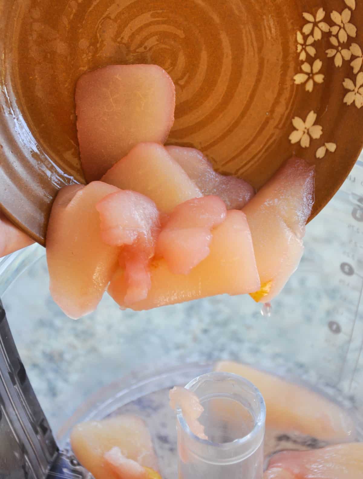 Pour pears into food processor 