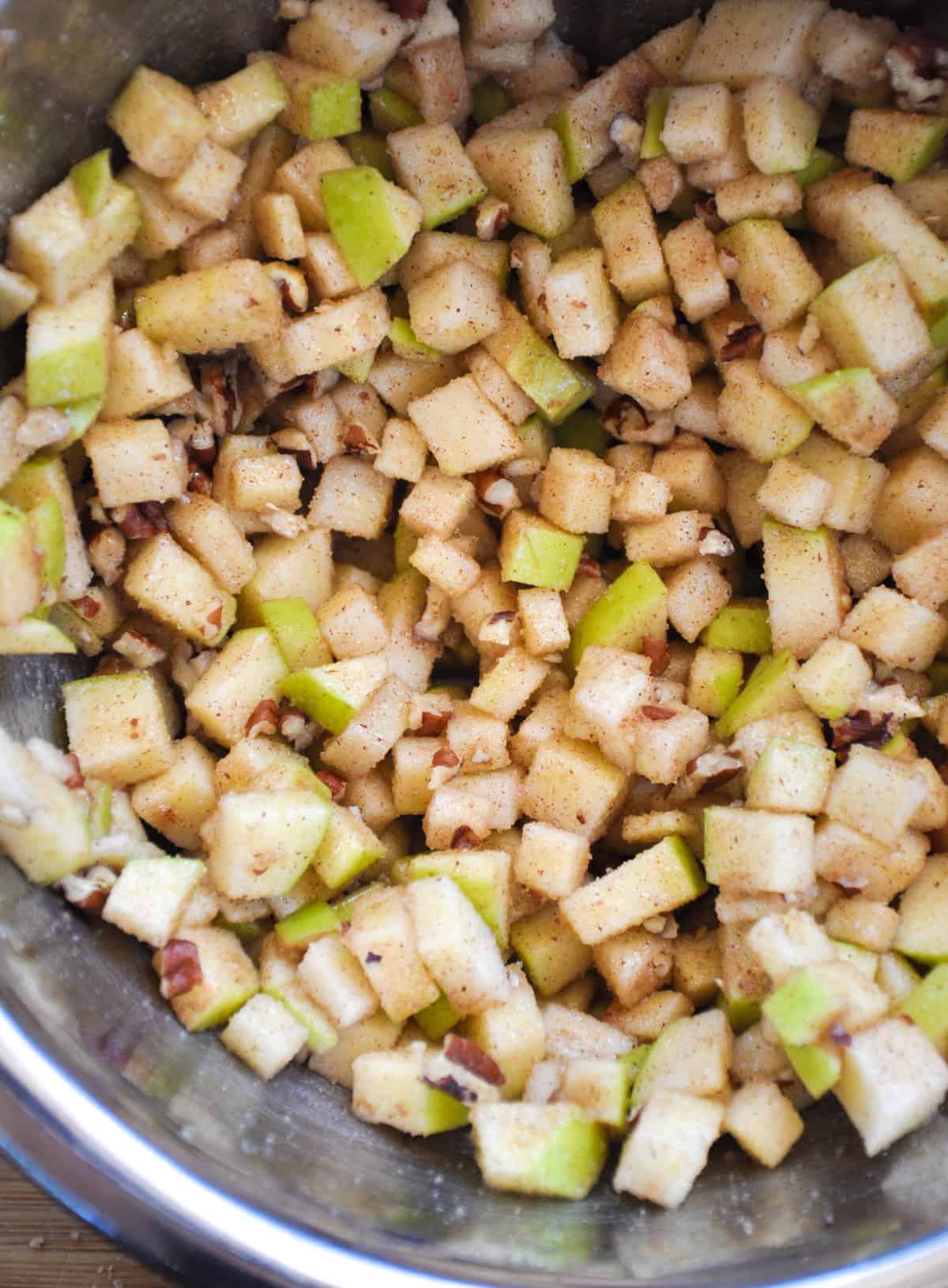 Diced granny smith apple with flour, sugar, and cinnamon mixture 