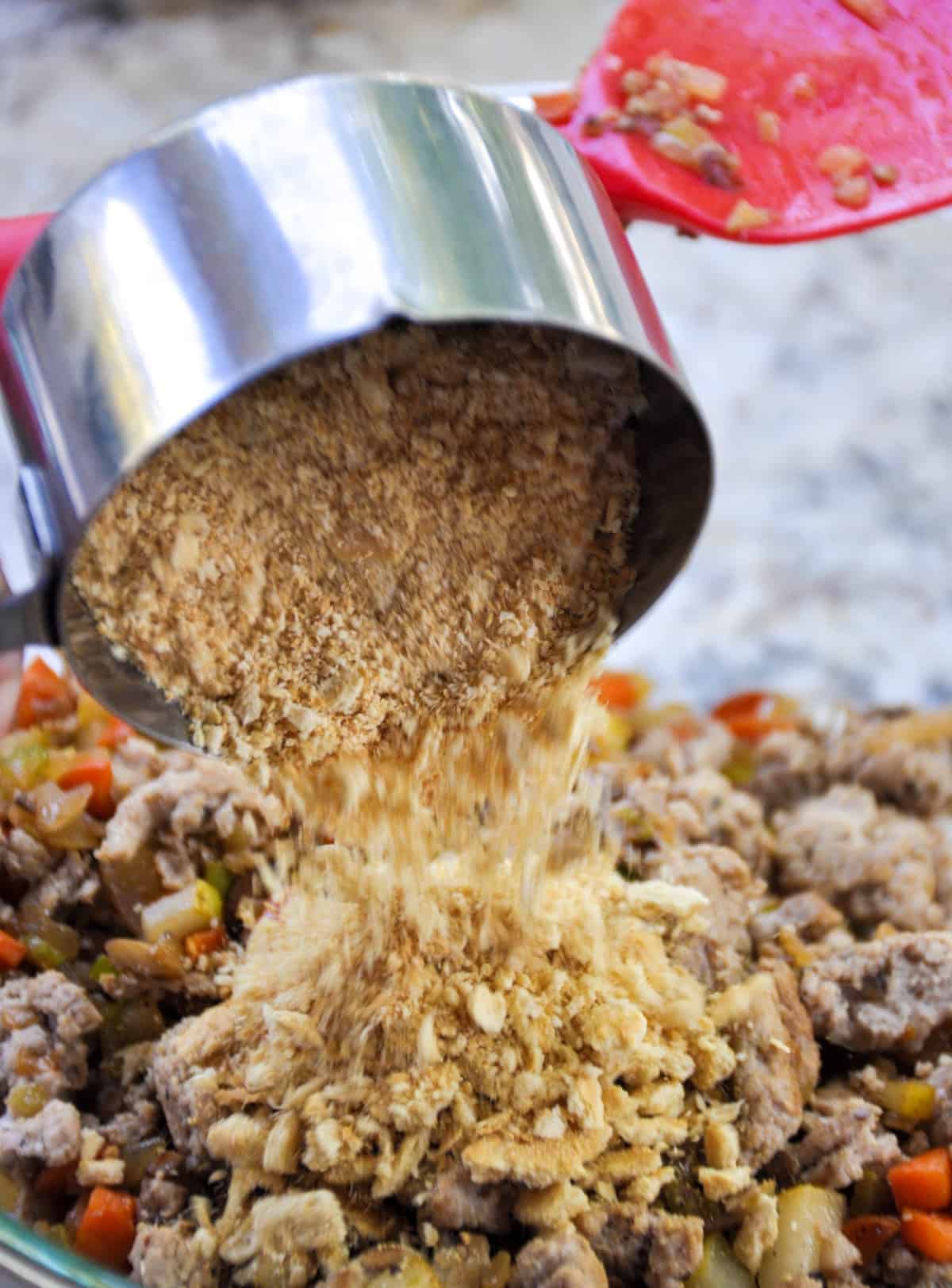 Add panko or crushed saltines to meat mixture