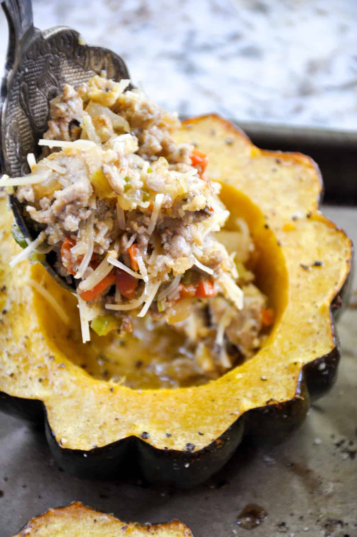 Roasted Acorn Squash stuffed with ground turkey, pears and parmesan! So dang yummy and the epitome of Fall dinner.