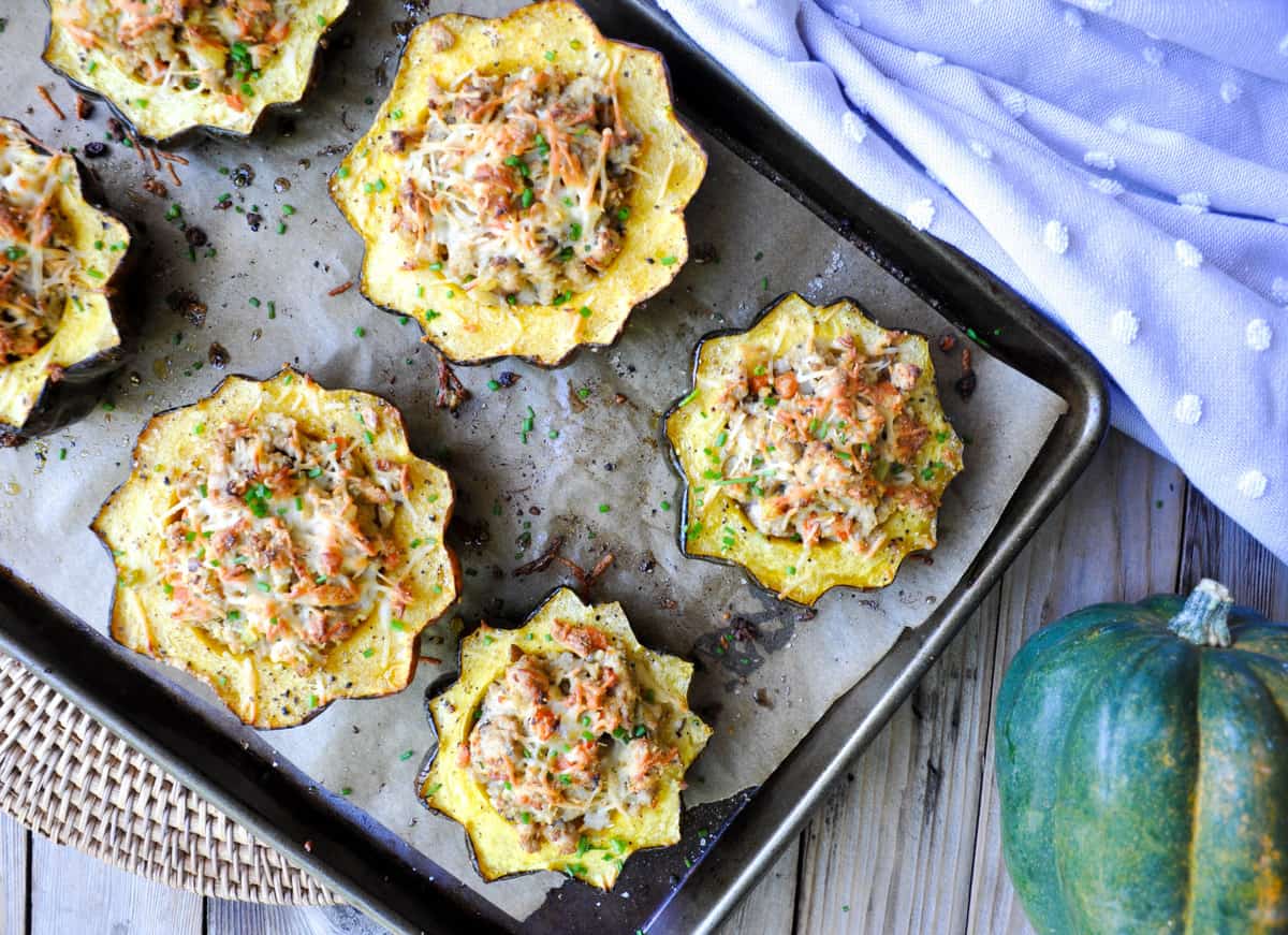 Roasted Acorn Squash stuffed with ground turkey, pears and parmesan! So dang yummy and the epitome of Fall dinner.