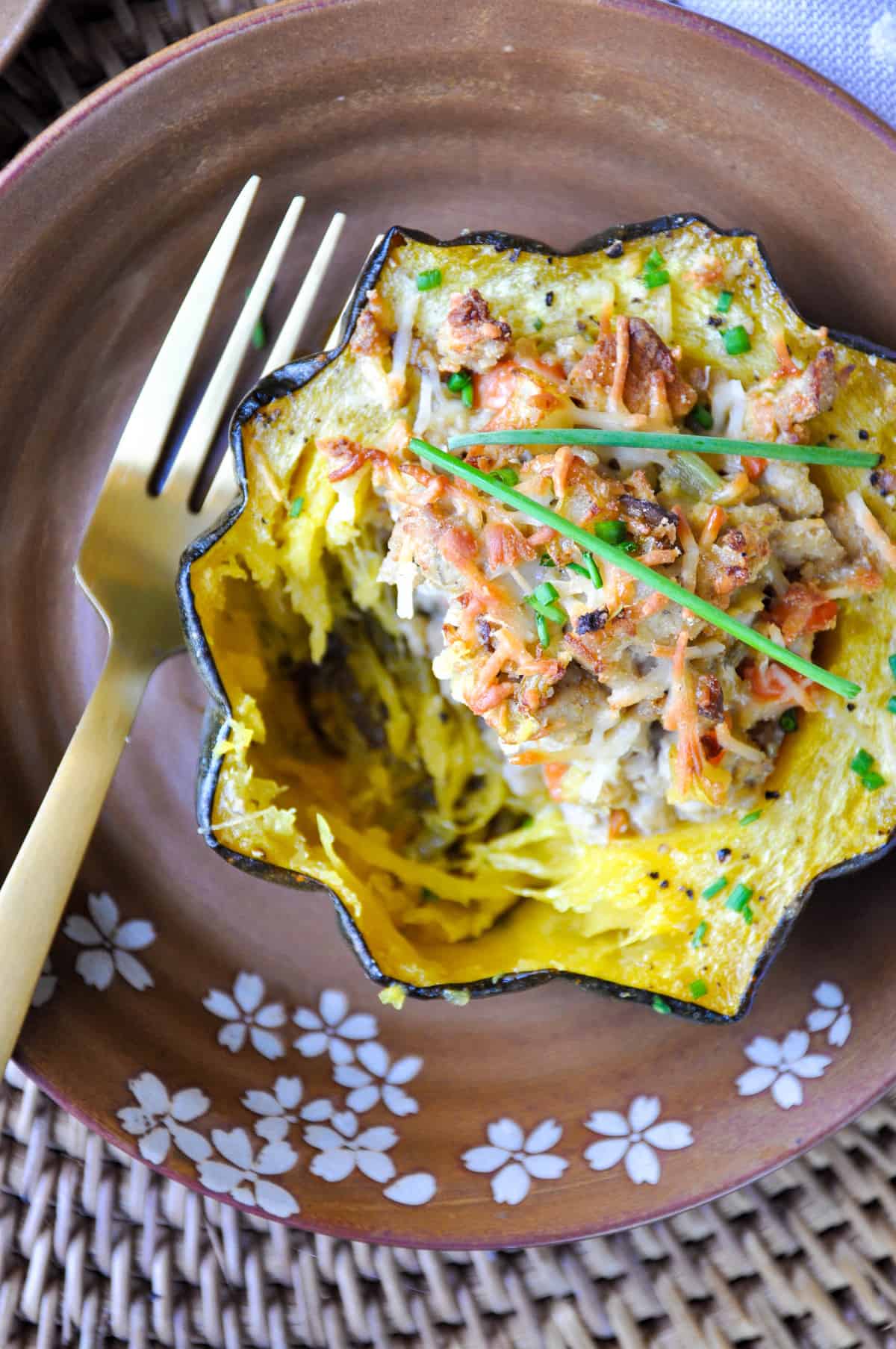 Roasted Acorn Squash stuffed with ground turkey, pears and parmesan! So dang yummy and the epitome of Fall dinner.