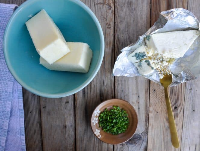 Ingredients needed to make blue cheese butter. Butter, blue cheese, and chives. This is the perfect topping for our recipe for cauliflower steaks
