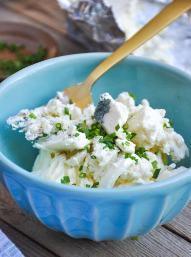 A bowl of ingredients for blue cheese butter.